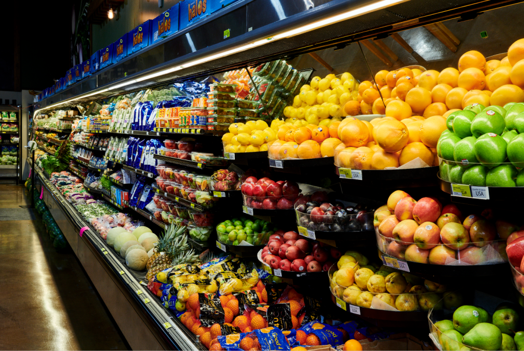 Colorful assortment of fresh fruits and vegetables on display in the produce department at Piggly Wiggly River Run in Birmingham, Alabama