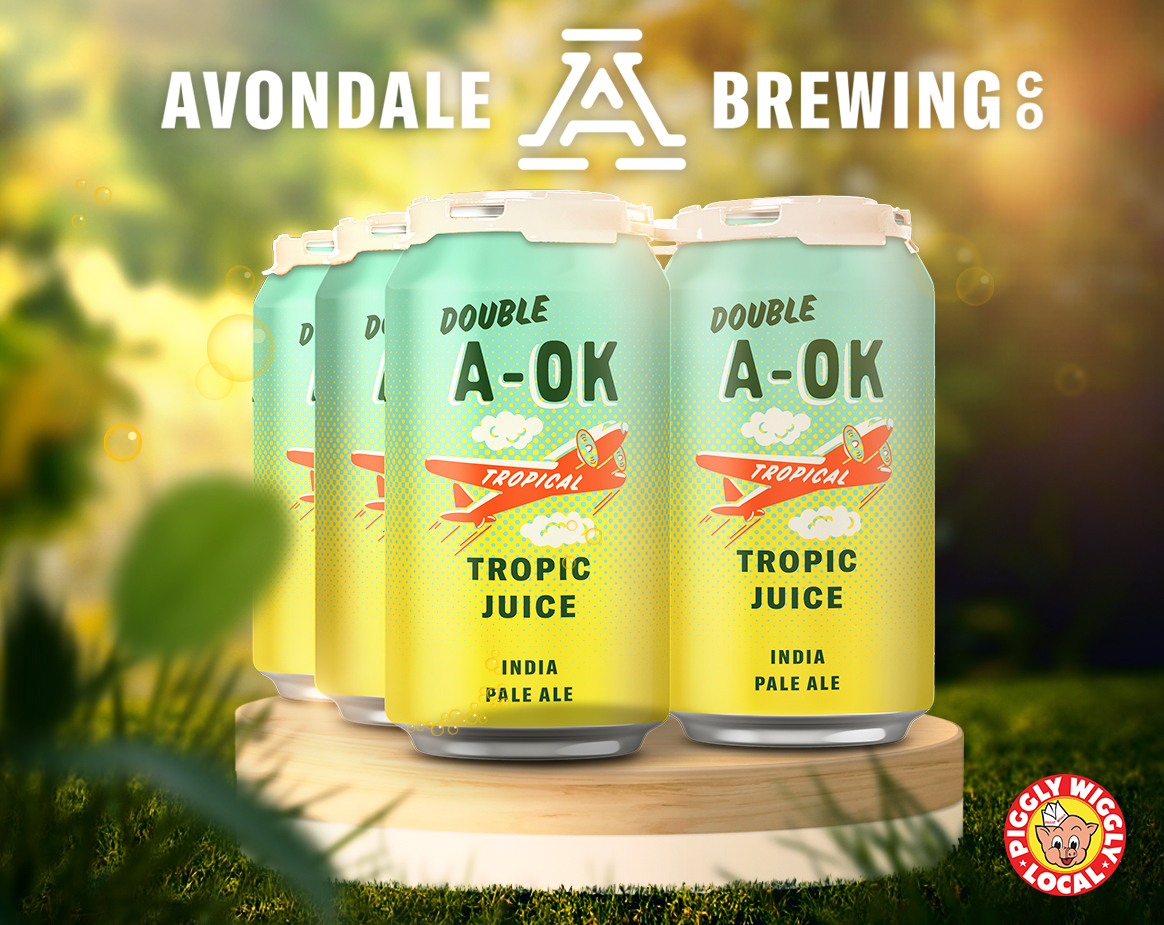 Four-pack of Double A-OK Tropic Juice IPA by Avondale Brewing on a wooden display with a sunny, nature-inspired background