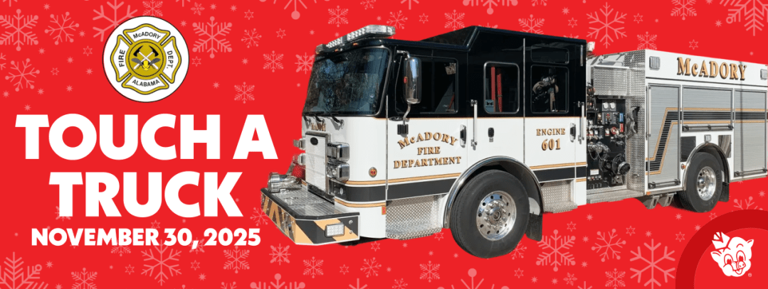 Fire truck from McAdory Fire Department promoting the Touch a Truck community event on November 30, 2025