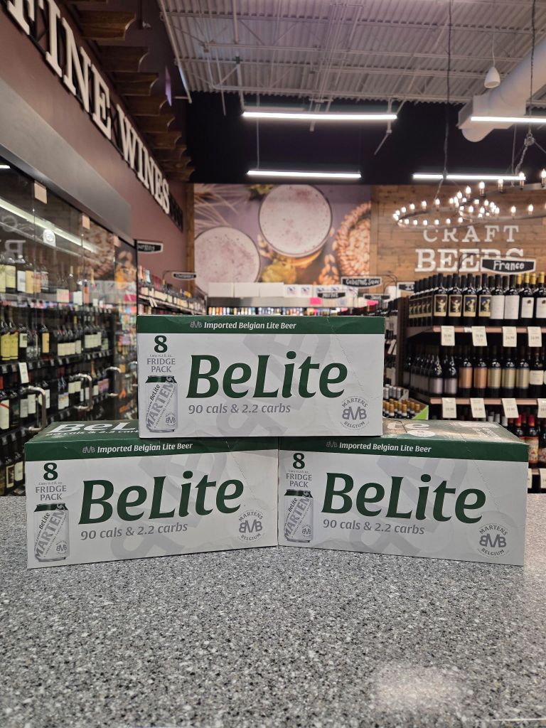 BeLite Belgian lite beer 8 pack cases displayed on a counter inside Piggly Wiggly Birmingham store