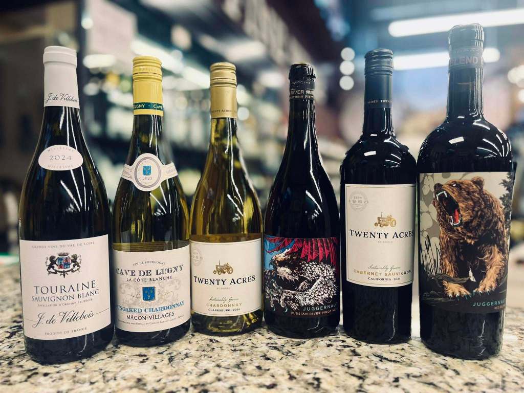Selection of white and red wine bottles displayed during a wine tasting event at Dunnavant Valley with Michael Kimbrough from Alabama Crown Distributing Co.